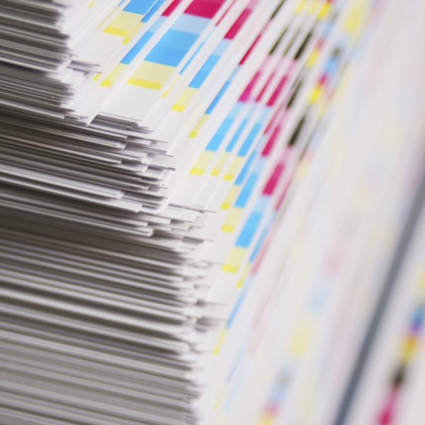 CMYK color bars on printed sheets of paper